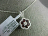 ESTATE .74CT DIAMOND & AAA RUBY 18KT WHITE GOLD CLASSIC FLOWER FLOATING PENDANT