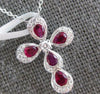 1.17CT DIAMOND & RUBY 18KT WHITE GOLD ROUND & PEAR SHAPE CROSS FLOATING PENDANT
