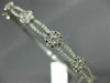 1.24CT DIAMOND 18KT WHITE GOLD 3D FLOWER CLUSTER SEMI ETERNITY BANGLE BRACELET