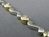 ESTATE .70CT DIAMOND 14KT WHITE & YELLOW GOLD ETOILE WAVE TENNIS BRACELET #5139