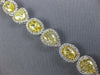 EXTRA LARGE 19.42CT WHITE & FANCY YELLOW DIAMOND 18KT WHITE GOLD TENNIS BRACELET