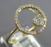 ESTATE .31CT DIAMOND 14K YELLOW GOLD ROUND & BAGUETTE FLOWER CIRCLE OF LIFE RING
