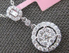 .52CT DIAMOND 14KT WHITE GOLD 3D ROUND & BAGUETTE CLUSTER HALO FLOATING PENDANT