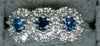 ESTATE .74CT DIAMOND & AAA SAPPHIRE 18KT WHITE GOLD 3D CLASSIC FLOWER LOVE RING