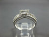 ESTATE .42CT DIAMOND 18KT WHITE GOLD ROUND & BAGUETTE CLASSIC CLUSTER FUN RING