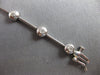 ESTATE .52CT DIAMOND 14K WHITE GOLD ROUND BEZEL BY THE YARD LOVE TENNIS BRACELET