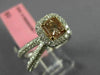 ESTATE 1.24CT WHITE & BROWNISH ORANGE DIAMOND 18KT WHITE & ROSE GOLD LOVE RING