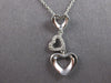 .06CT DIAMOND 14KT WHITE GOLD 3D OPEN HEART JOURNEY PAST PRESENT FUTURE PENDANT