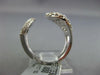 ESTATE LARGE 1.47CT ROUND DIAMOND 14KT WHITE GOLD OVAL OPEN CLUSTER TENSION RING