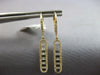 LONG .55CT DIAMOND 14KT YELLOW GOLD ROUND & BAGUETTE ELONGATED OVAL FUN EARRINGS