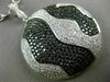 LARGE 4.51CT WHITE & BLACK DIAMOND 18KT WHITE & BLACK GOLD CIRCULAR WAVE PENDANT