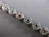 7.04CT DIAMOND & AAA EMERALD 18KT 2 TONE GOLD PEAR SHAPE & ROUND TENNIS BRACELET