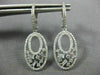 ESTATE .75CT ROUND AND BAGUETTE DIAMOND 14KT WHITE GOLD 3D OVAL HANGING EARRINGS