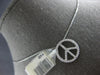 ESTATE .25CT DIAMOND 14K WHITE GOLD CLASSIC PEACE SIGN CIRCULAR FLOATING PENDANT