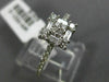 ESTATE .57CT ROUND & BAGUETTE DIAMOND 18KT WHITE GOLD CLUSTER SEMI ETERNITY RING