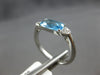 ESTATE 1.22CT DIAMOND & AAA BLUE TOPAZ 14KT WHITE GOLD CUSHION & ROUND FUN RING