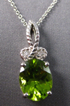 2.29CT DIAMOND & AAA PERDIOT 14KT WHITE GOLD OVAL & ROUND FUN FLOATING PENDANT