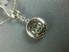ESTATE .58CT DIAMOND 18KT WHITE GOLD 3D CLASSIC HALO ROUND & BAGUETTE PENDANT