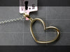 ESTATE .26CT DIAMOND 14KT YELLOW GOLD CLASSIC OPEN HEART LOVE FLOATING PENDANT