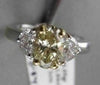 FANCY YELLOW 1.75CT DIAMOND 18KT GOLD ENGAGMENT RING