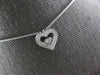 SMALL .13CT DIAMOND 14KT WHITE GOLD DANCING HEART FILIGREE FUN FLOATING PENDANT