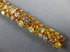 WIDE 28.14CT MULTI COLOR DIAMOND 18K YELLOW GOLD GRADUATING LOVE TENNIS BRACELET