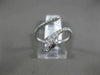 ESTATE .27CT DIAMOND & AAA RUBY 18KT WHITE GOLD 3D CRISS CROSS SNAKE FUN RING