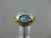 ESTATE .92CT DIAMOND & AAA OVAL TANZANITE 14KT YELLOW GOLD SEMI BEZEL LOVE RING