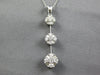1.06CT DIAMOND 14KT WHITE GOLD FLOWER PAST PRESENT FUTURE JOURNEY LOVE PENDANT