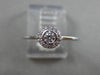 ESTATE .15CT DIAMOND 18KT WHITE GOLD CLASSIC FLOWER HALO BEZEL FRIENDSHIP RING