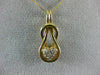 ESTATE .25CT DIAMOND 14KT YELLOW GOLD HEART LOVE KNOT INFINITY FLOATING PENDANT