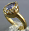 1.12CT DIAMOND & AAA TANZANITE 14KT YELLOW GOLD PEAR SHAPE HALO ENGAGEMENT RING
