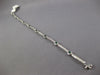 2.30CT DIAMOND & AAA EMERALD 14KT WHITE GOLD 3D ROUND BEZEL LOVE TENNIS BRACELET