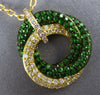 1.81CT DIAMOND & AAA TSAVORITE 18KT YELLOW GOLD 3D INTERTWINING CIRCULAR PENDANT