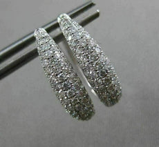 ESTATE .71CT DIAMOND 18KT WHITE GOLD CLASSIC ELONGATED PAVE OVAL HUGGIE EARRINGS