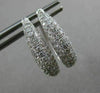 ESTATE .71CT DIAMOND 18KT WHITE GOLD CLASSIC ELONGATED PAVE OVAL HUGGIE EARRINGS