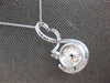 LARGE .36CT DIAMOND & SOUTH SEA PEARL 18KT WHITE GOLD LOVE KNOT FLOATING PENDANT
