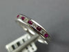 .27CT DIAMOND & AAA RUBY 18KT WHITE GOLD CLASSIC ROUND CHANNEL ANNIVERSARY RING