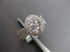 LARGE 1.96CT DIAMOND 18KT WHITE GOLD ROUND INVISIBLE OVAL HALO ENGAGEMENT RING