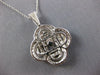 ESTATE LARGE 1.16CT DANCING DIAMOND 14KT WHITE GOLD 3D LOVE KNOT FLOWER PENDANT