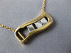 ESTATE .17CT DIAMOND 18KT WHITE & ROSE GOLD 3 STONE ETOILE FLOATING LOVE PENDANT