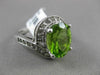 ESTATE WIDE 4.15CT DIAMOND & AAA PERIDOT 14KT WHITE GOLD OVAL INFINITY FUN RING