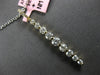 ESTATE .77CT DIAMOND 14KT YELLOW GOLD JOURNEY SHARED PRONG BAR FLOATING PENDANT