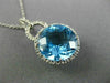 ESTATE LARGE 6.60CT DIAMOND & BLUE TOPAZ 14KT WHITE GOLD HALO ROUND HALO PENDANT