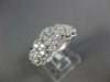 ESTATE 1.07CT DIAMOND 18KT WHITE GOLD MULTI FLOWER HALO CLASSIC ANNIVERSARY RING