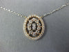 ESTATE .41CT DIAMOND 14KT WHITE AND ROSE GOLD 3D OVAL BY THE YARD LOVE PENDANT
