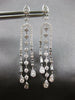 LONG 1.25CT DIAMOND 14KT WHITE GOLD ROUND & BAGUETTE HORSESHOE HANGING EARRINGS