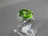 ESTATE WIDE 4.15CT DIAMOND & AAA PERIDOT 14KT WHITE GOLD OVAL INFINITY FUN RING