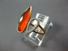 .09CT DIAMOND & AAA ORANGE AGATE 14KT ROSE GOLD PEAR SHAPE CRISS CROSS FUN RING