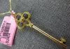 LARGE .18CT FANCY YELLOW DIAMOND 18KT YELLOW GOLD 3D KEY TO YOUR HEART PENDANT